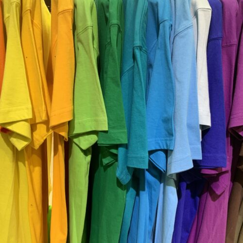 Colorful shirts in the order of the rainbow