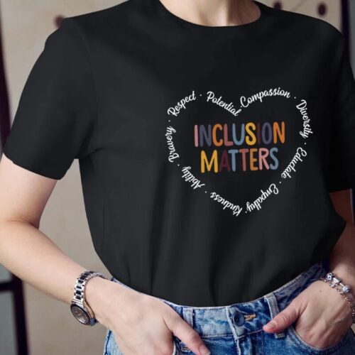 A t-shirt with a heart that reads 'Inclusion Matters'