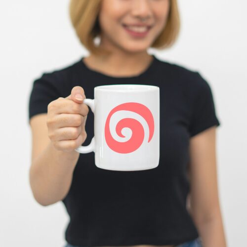 A woman holds a white mug with the iCandee logo imprinted on it